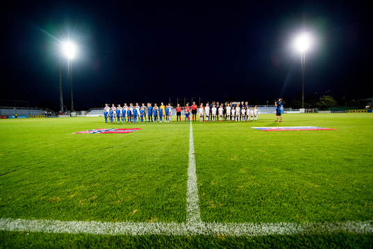 Both teams line up
