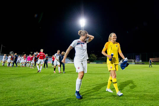 Isabell Herlovsen and goalkeeper Ingrid Hjelmseth of Norway