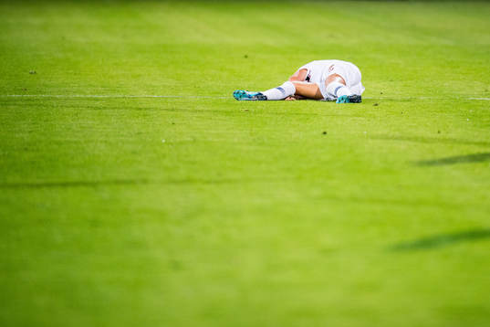 Frida Maanum of Norway lies down with an injury