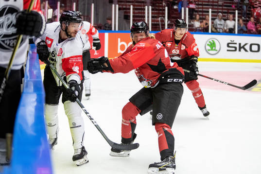 Patrik Björkstrand of TPS Åbo and Marcus SYlvegård of