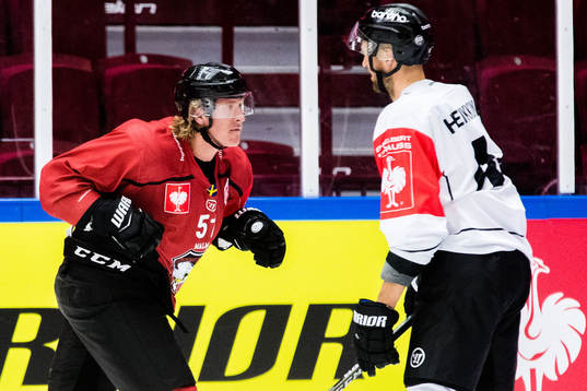 Emil A Sylvegård of Malmö Redhawks and Ilkka Heikkinen of