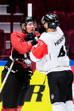 Emil A Sylvegård of Malmö Redhawks and Ilkka Heikkinen of