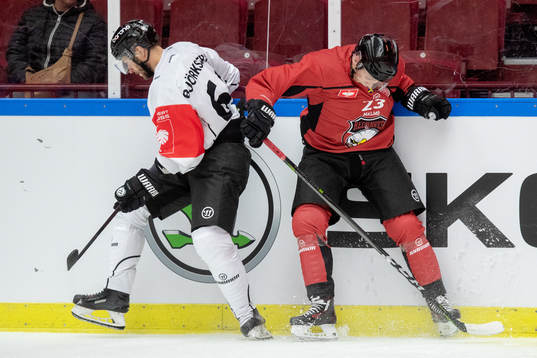 Patrik Björkstrand of TPS Åbo and Christoffer Forsberg of