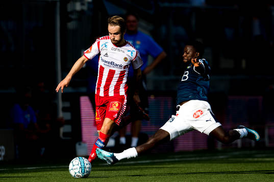 Daniel Berntsen of Tromsø and Francisco Júnior of