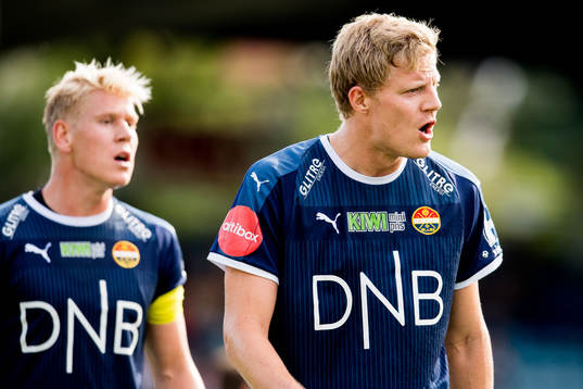 Lars Sætra and Jakob Glesnes of Strømsgodset react