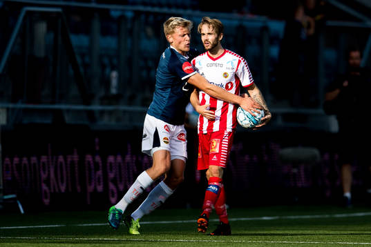 Jonathan Parr of Strømsgodset and Daniel Berntsen of