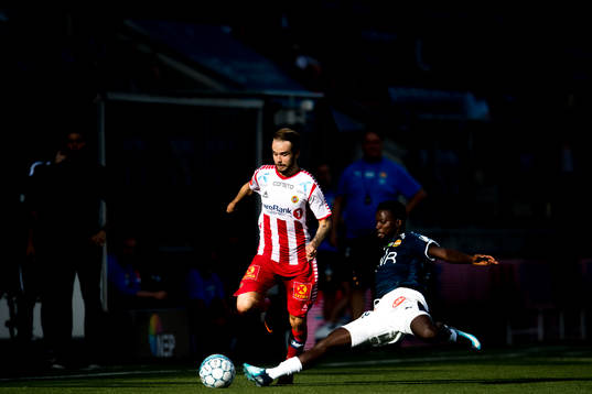 Daniel Berntsen of Tromsø and Francisco Júnior of
