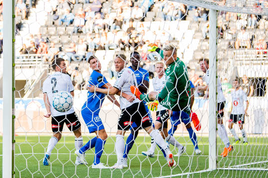 Ruben Gabrielsen of Molde (hidden) scores 0-1 behind