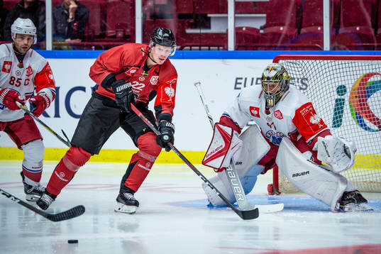 Lars Bryggman of Malmö Redhawks and Goalkeeper Alexander