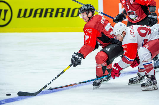 Tobias Ekberg of Malmö Redhawks and Stanislav Lopachuk of