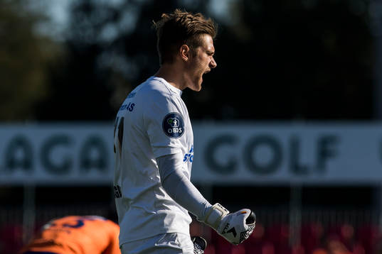 Goalkeeper Stefan Hagerup of Ull/Kisa celebrates