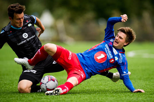 Niels Vorthoren of Sandnes Ulf and Vegard Lysvoll of