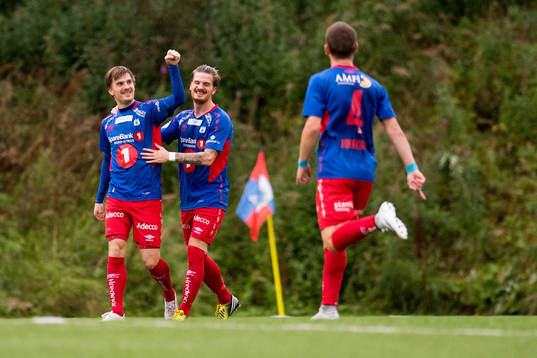 Vegard Lysvoll of Tromsdalen celebrates the 2-0 goal with