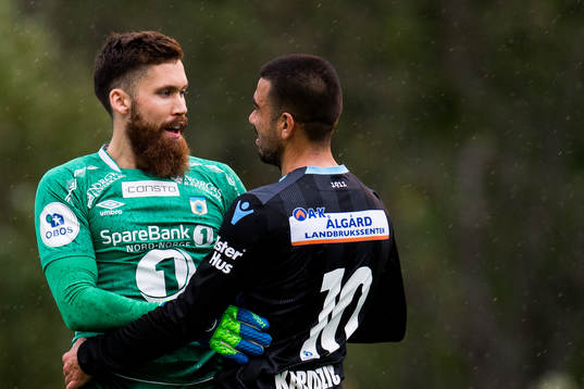 Goalkeeper Marius Berntzen of Tromsdalen and Sanel Kapidzic