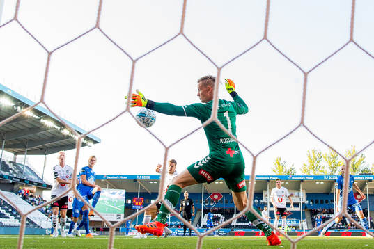 Goalkeeper Sondre Rossbach of Odd saves an attempt from