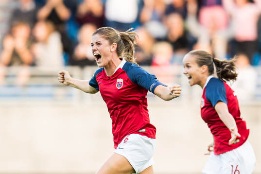 Maren Mjelde and Guro Reiten of Norway celebrate at the