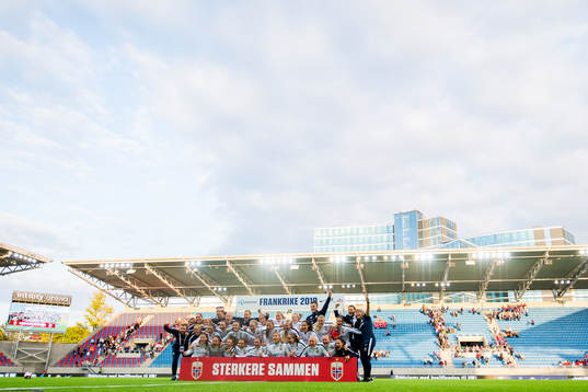 Players and staff of Norway celebrate