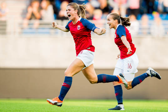 Maren Mjelde and Guro Reiten of Norway celebrate at the