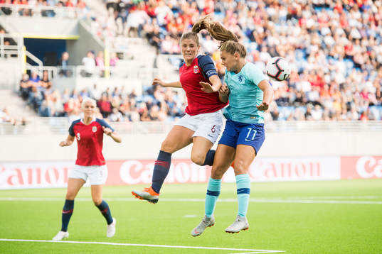 Maren Mjelde of Norway and Lieke Martens of Netherlands