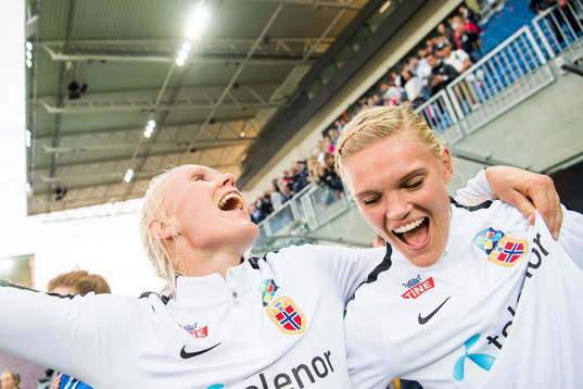 Maria Thorisdottir and Kristine Leine of Norway celebrate