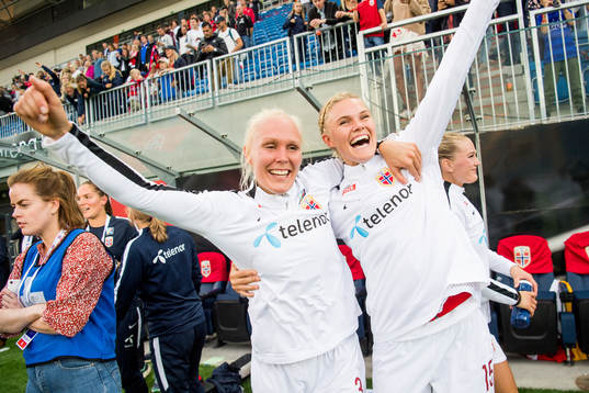 Maria Thorisdottir and Kristine Leine of Norway celebrate
