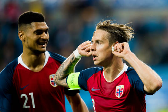 Stefan Johansen of Norway celebrates with Bjørn Maars