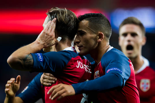 Stefan Johansen of Norway celebrates with Omar Elabdellaoui