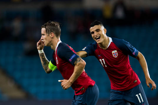 Stefan Johansen of Norway celebrates with Mohamed
