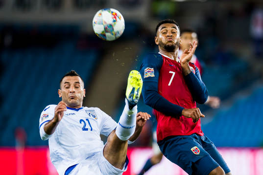 Giorgos Vasiliou of Cyprus and Joshua King of Norway