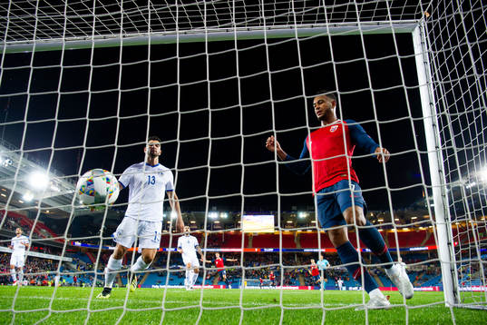 Ioannis Kousoulos of Cyprus and Joshua King of Norway watch