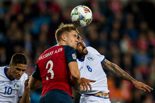 Kristoffer Ajer of Norway and Charalambos Kyriakou of Cyprus