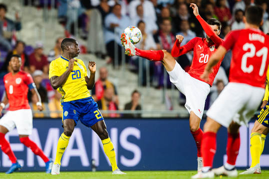Ken Sema  of Sweden and Florian Grillitsch of Austria