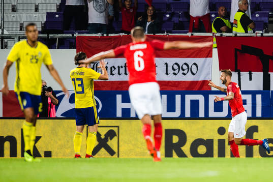 Guido Burgstaller of Austria celebrates scoring 1-0