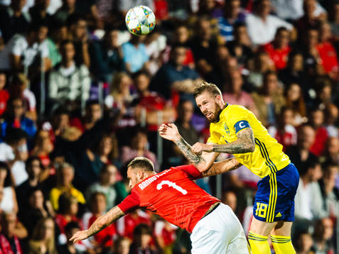 Marko Arnautovic of Austria and Pontus Jansson of Sweden