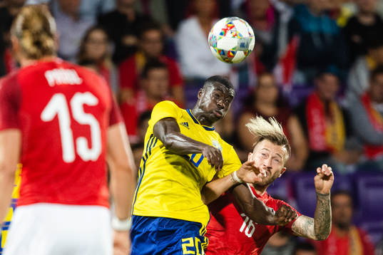 Ken Sema  of Sweden and Peter Zulj of Austria competes for