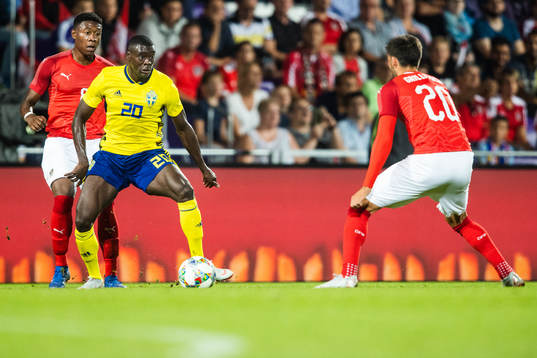 Ken Sema of Sweden and David Alaba of Austria