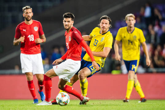 Florian Grillitsch of Austria and Gustav Svensson of Sweden