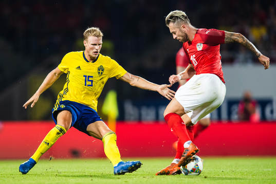 Oscar Hiljemark of Sweden and Peter Zulj of Austria