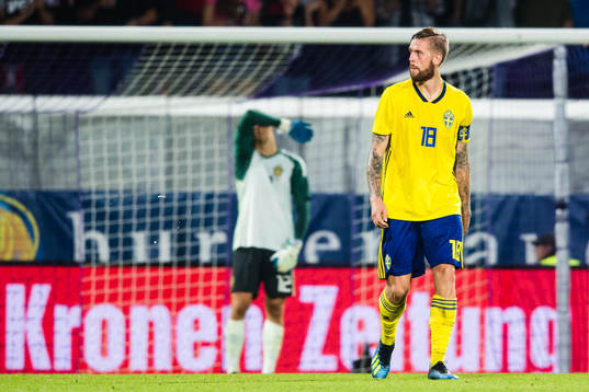 Pontus Jansson of Sweden looks dejected