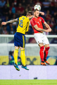 Pontus Jansson of Sweden and Marko Arnautovic of Austria