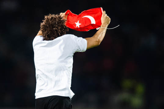 A pitch invader with a turkish flag