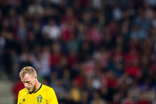 John Guidetti of Sweden looks dejected