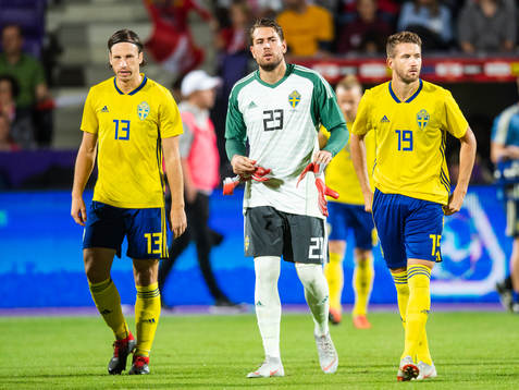 Gustav Svensson, goalkeeper Kristoffer Nordfeldt, and
