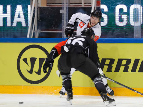 Konstantin Komarek #67, Malmö Redhawks and Hannu Kuru #56,