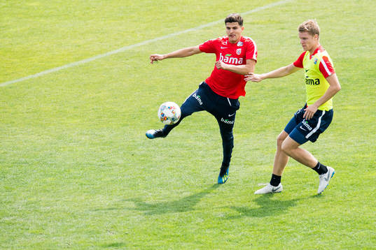 Tarik Elyounoussi and Sigurd Rosted of Norway
