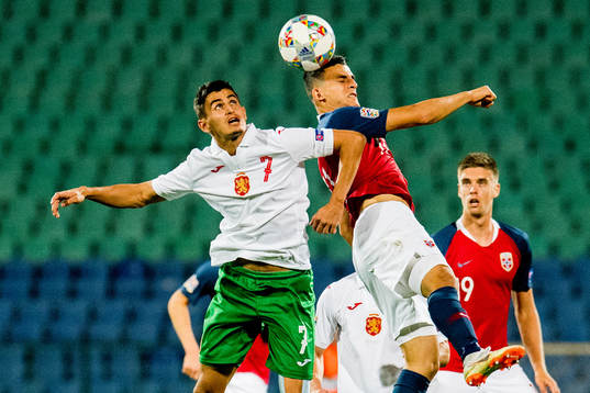 Georgi Kostadinov of Bulgaria and Mohamed Elyounoussi of