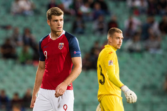 Alexander Sørloth of Norway and goalkeeper Plamen Iliev of