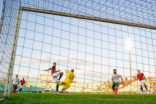 Bjørn Maars Johnsen of Norway and goalkeeper Plamen Iliev