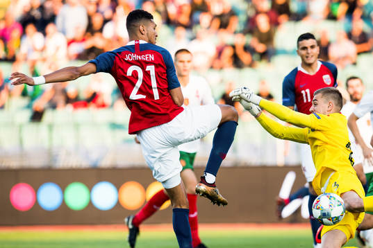 Bjørn Maars Johnsen of Norway and goalkeeper Plamen Iliev
