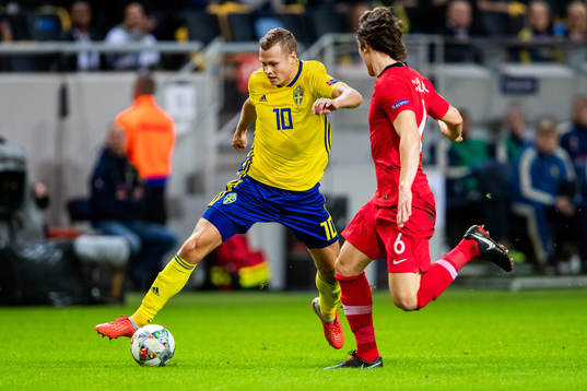 Viktor Claesson of Sweden and Caglar Söyuncu of Turkey